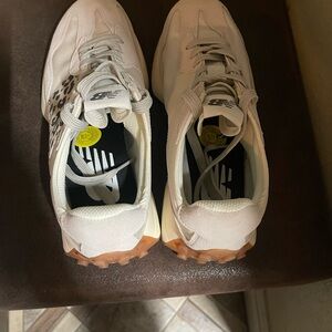 New Balance White Sneakers with Leopard Accent
